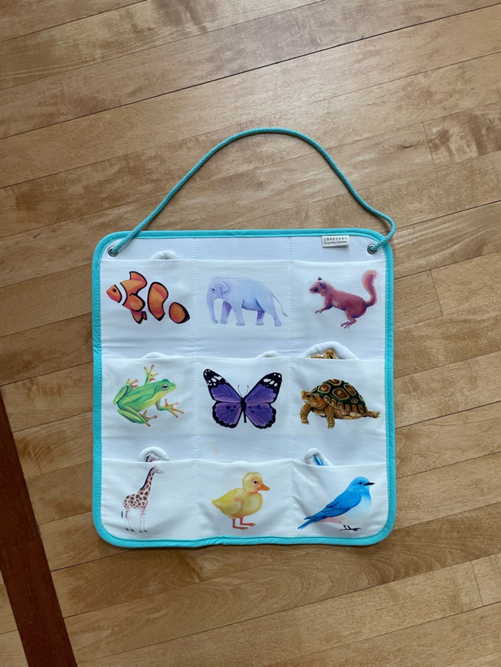 [Lovevery] Pocket Activity Panel in Turquoise with Animal Prints